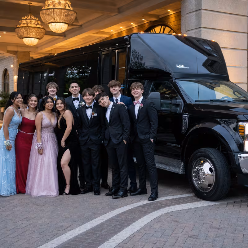Party bus interior with wraparound leather seating and LED lighting in Fort Wayne