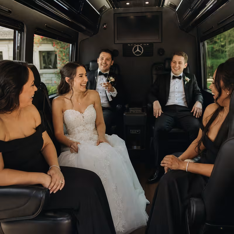 Black Mercedes Sprinter van staged for an Fort Wayne Wedding Transportation group